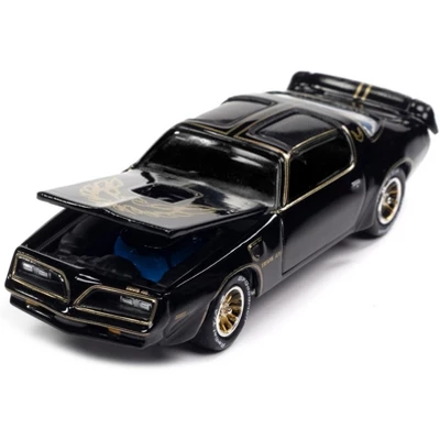1977 Pontiac Trans Am Black W/Gold Eagle Graphic W/Token & Game Card Trivial Pursuit 1/64 Diecast Model Car By Johnny Lightning 2 1977 Pontiac Trans Am Black W/Gold Eagle Graphic W/Token & Game Card Trivial Pursuit 1/64 Diecast Model Car By Johnny Lightning - Image 2