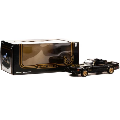 1977 Pontiac Firebird Trans Am T/A Starlite Black With Golden Eagle Hood And Stripes 1/24 Diecast Model Car By Greenlight 2 1977 Pontiac Firebird Trans Am T/A Starlite Black With Golden Eagle Hood And Stripes 1/24 Diecast Model Car By Greenlight - Image 2