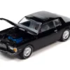 1979 Chevrolet Monte Carlo Black With Poker Chip And Game Card "Trivial Pursuit" 1/64 Diecast Model Car By Johnny Lightning
